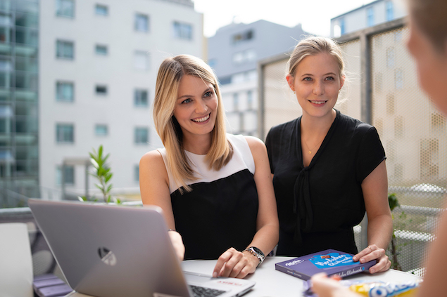 two women working