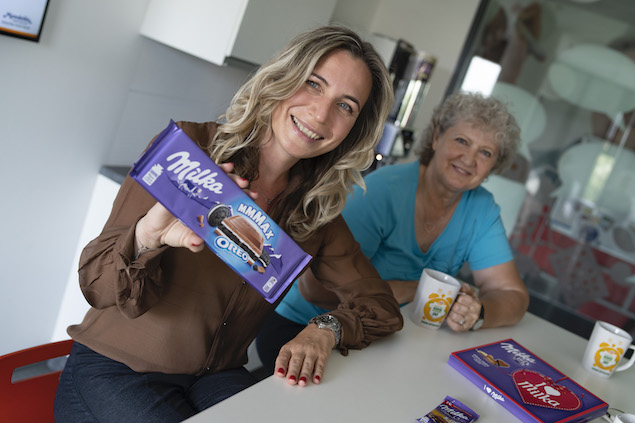 two woment with Milka products