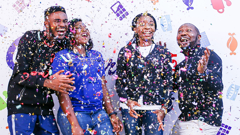 Group of young adults laughing