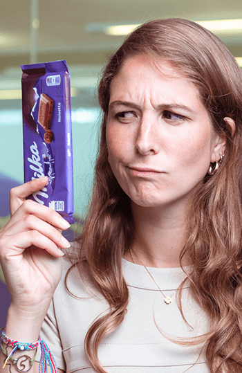 Person holding Milka product