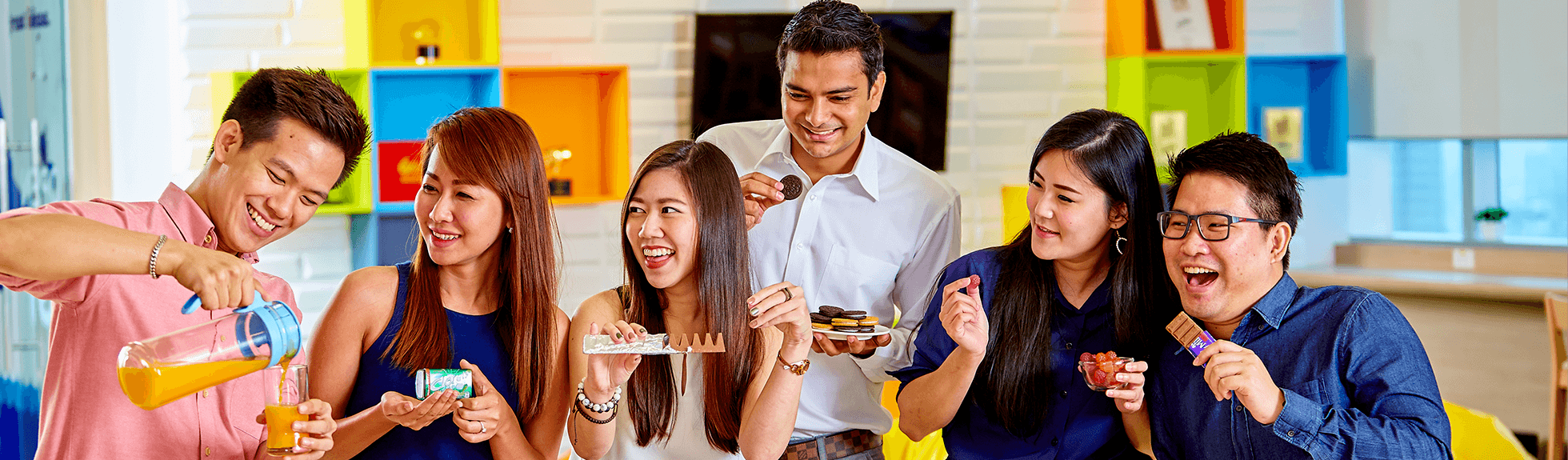Mondelez Singapore employees holding Mondelez products