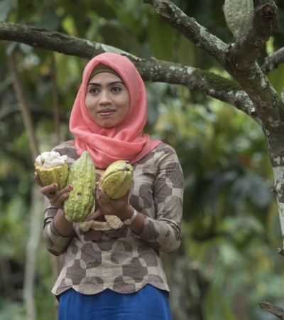 woman with cocoa pods