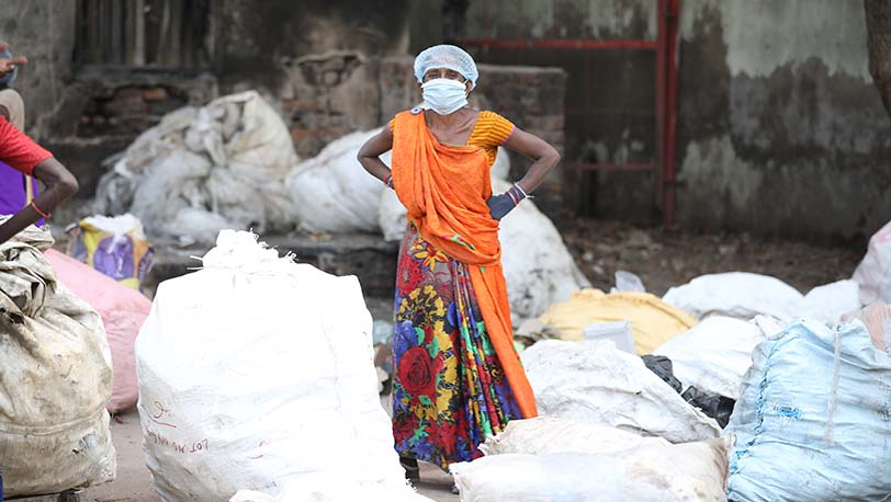 woman collecting trash